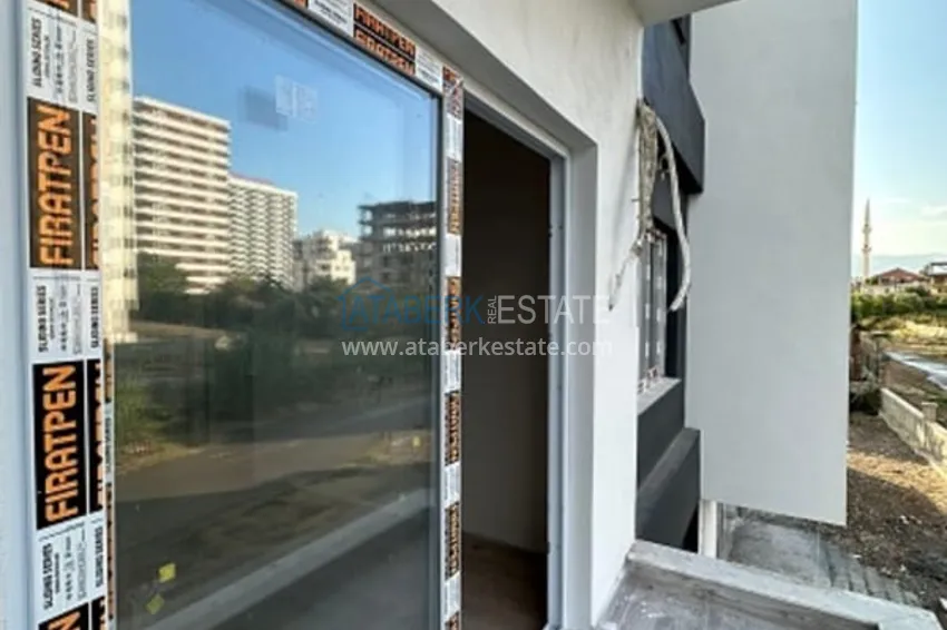 Purchase Apartment 1+1 with finishing in 300 meters from the sea Tomyuk district - Mersin 15 