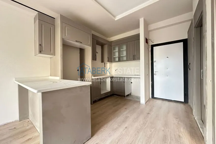 Purchase Apartment 1+1 with finishing in 300 meters from the sea Tomyuk district - Mersin 5 