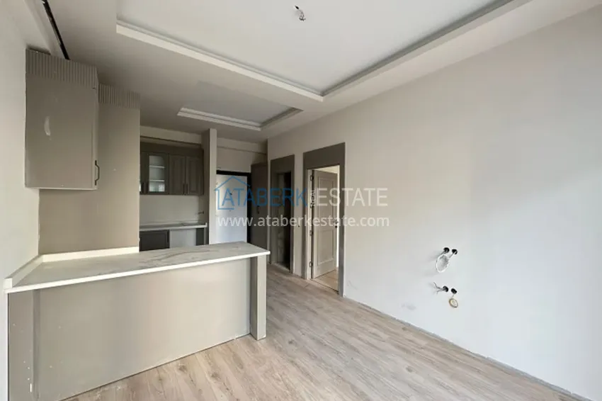 Purchase Apartment 1+1 with finishing in 300 meters from the sea Tomyuk district - Mersin 1 