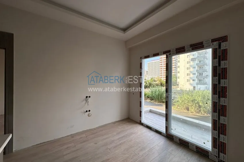 Purchase Apartment 1+1 with finishing in 300 meters from the sea Tomyuk district - Mersin 2 