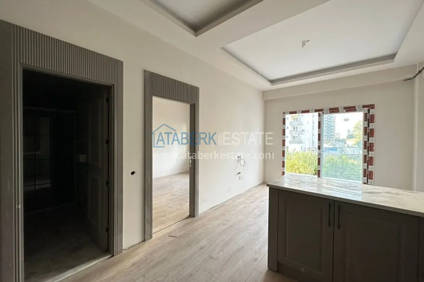 Purchase Apartment 1+1 with finishing in 300 meters from the sea Tomyuk district - Mersin 3 