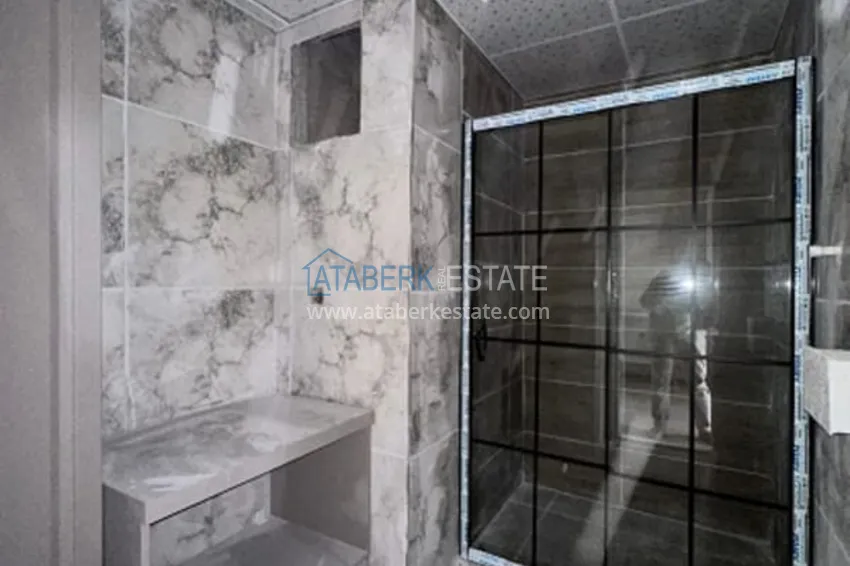 Purchase Apartment 1+1 with finishing in 300 meters from the sea Tomyuk district - Mersin 13 