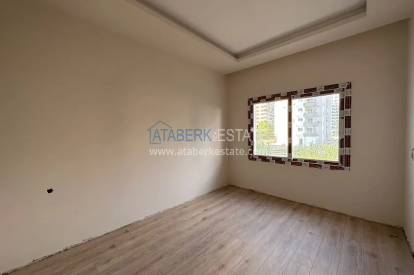 Purchase Apartment 1+1 with finishing in 300 meters from the sea Tomyuk district - Mersin 11 