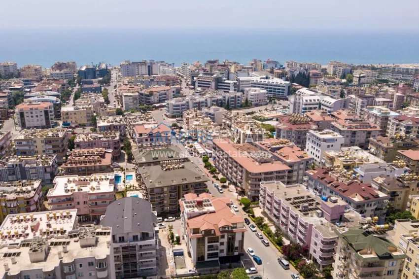 One bedroom apartment with furniture and a glazed balcony in Oba, Alanya 1 