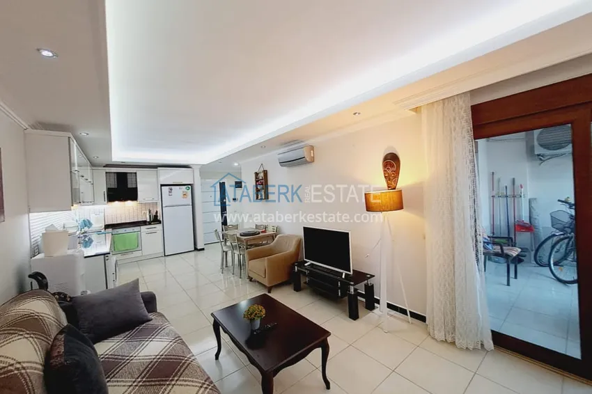 Purchase  One bedroom apartment with furniture and a glazed balcony in Oba, Alanya 4 