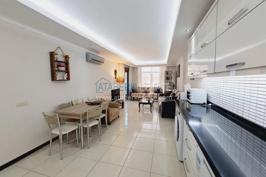 Purchase  One bedroom apartment with furniture and a glazed balcony in Oba, Alanya 8 