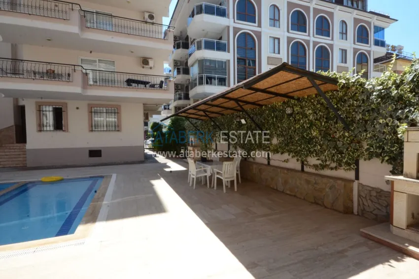 Real estate for residence permit. Two three-room apartments with furniture - Oba district, 200 meters from the sea 11 