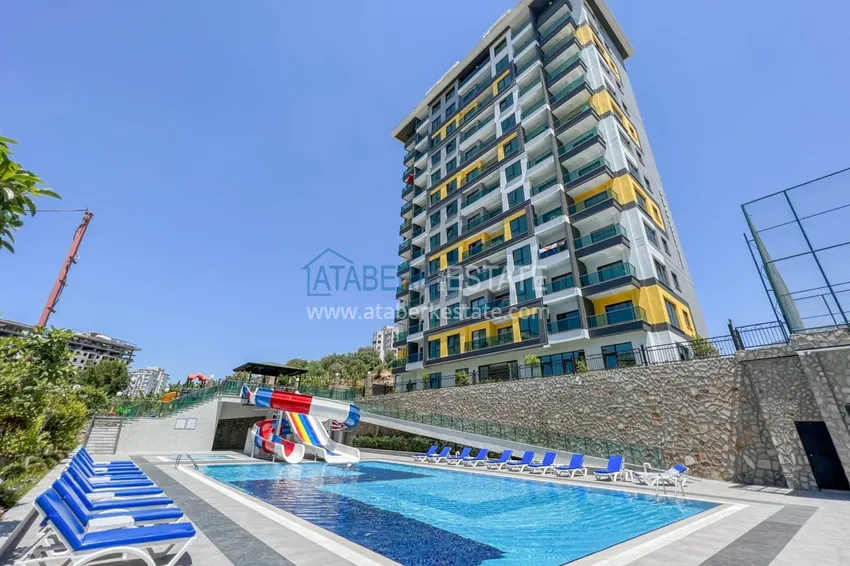 Furnished apartment in Mahmutlar, in a young residential complex  1 