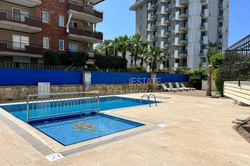 Two-bedroom apartment for a residence permit, furnished in a cozy complex - Oba district, Alanya 4 