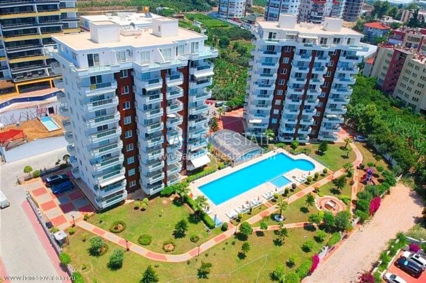 1+1 apartment with furniture and a glazed balcony 450 meters from the sea — Mahmutlar, Alanya 1 
