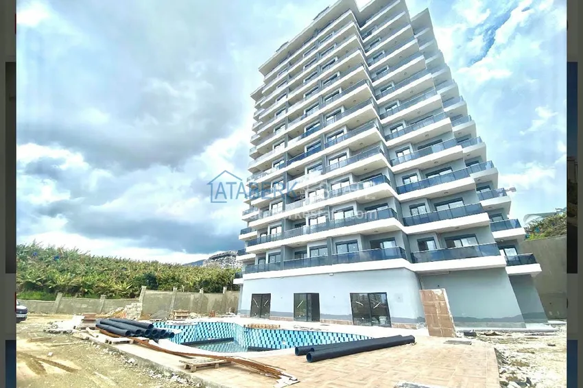 Apartment in Mahmutlar from an investor in a residential complex under construction 1 