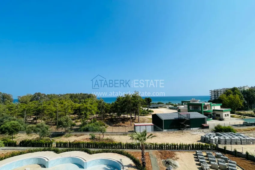 Photo - Apartments 4+1 with sea view in a new residential complex in Davultepe-Mersin area 2