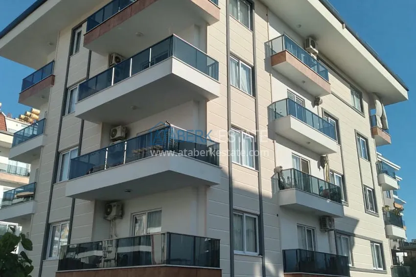 Three-room apartment in Alanya, Oba district in a cozy urban complex 1 
