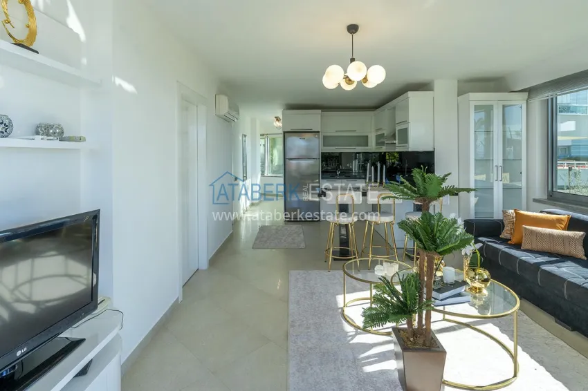 Purchase Turnkey apartment on the beachfront in Alanya, Oba district. Suitable for a residence permit 1 