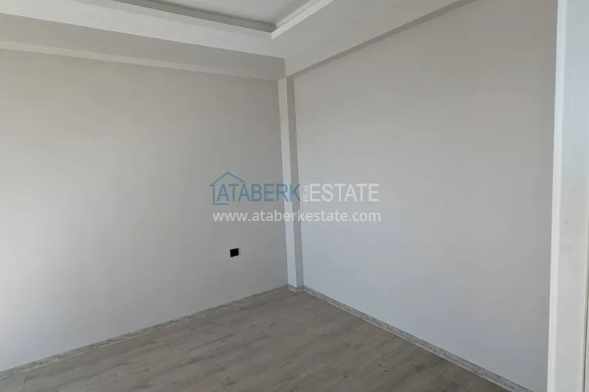 Purchase  One bedroom apartment with separate kitchen and side sea view in Mersin, Tomyuk district 12 