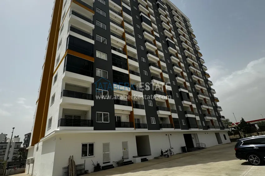 One bedroom Apartment with Fine Finishing and Mountain View in Tomyuk District, Mersin. Installment is possible 18 