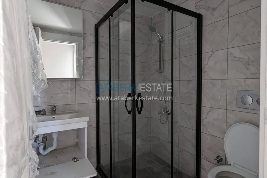 Purchase  One bedroom Apartment with Fine Finishing and Mountain View in Tomyuk District, Mersin. Installment is possible 13 