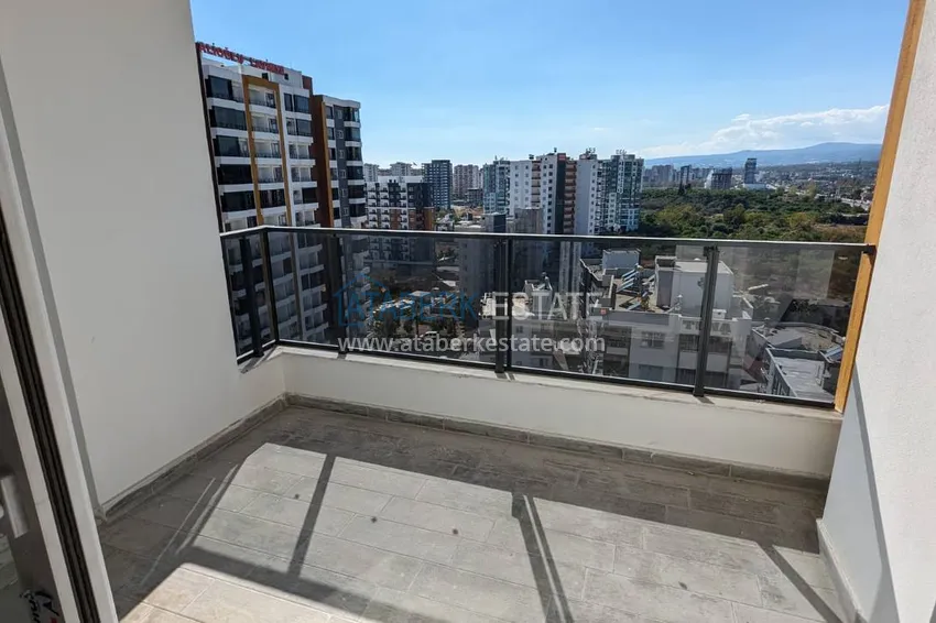 Purchase  One bedroom Apartment with Fine Finishing and Mountain View in Tomyuk District, Mersin. Installment is possible 14 