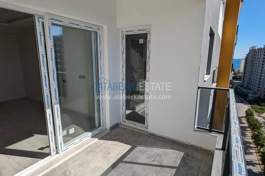 Purchase  One bedroom Apartment with Fine Finishing and Mountain View in Tomyuk District, Mersin. Installment is possible 15 