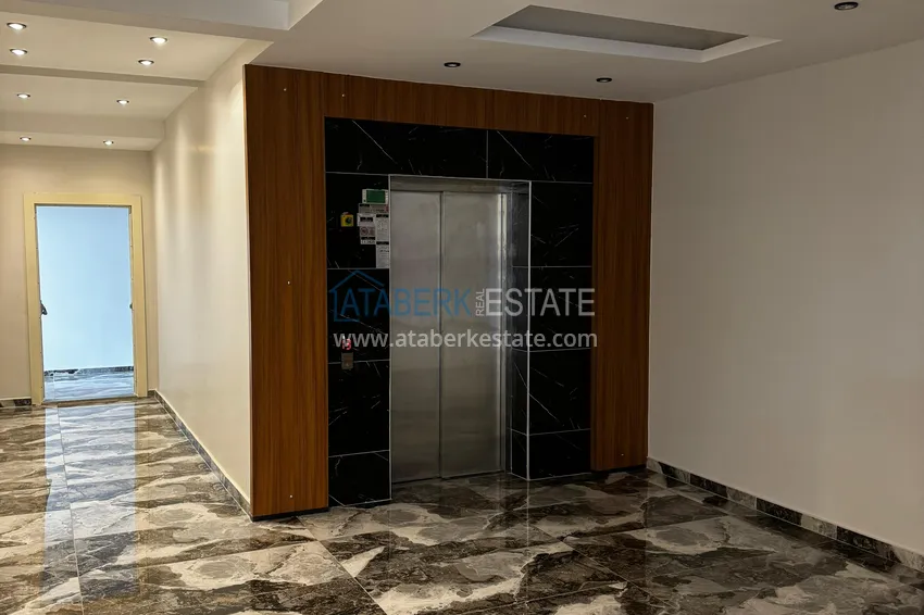 One bedroom apartment with separate kitchen and side sea view in Mersin, Tomyuk district 26 