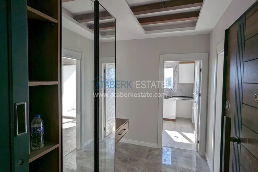 Purchase  One bedroom apartment with separate kitchen and side sea view in Mersin, Tomyuk district 1 