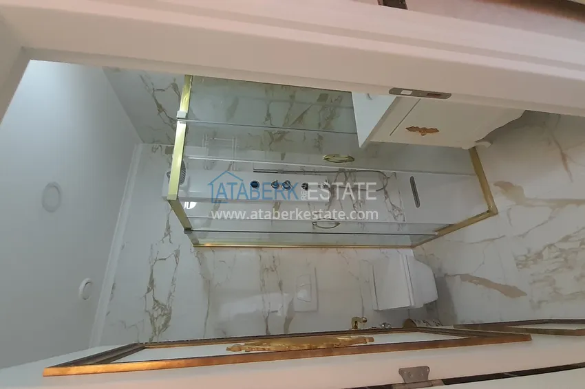 Purchase  Linear 3+1 apartment in a luxury complex on the beachfront in the center of Alanya 31 