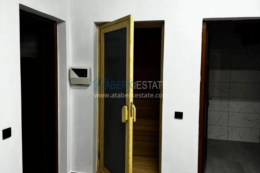 One bedroom apartment with separate kitchen and side sea view in Mersin, Tomyuk district 33 