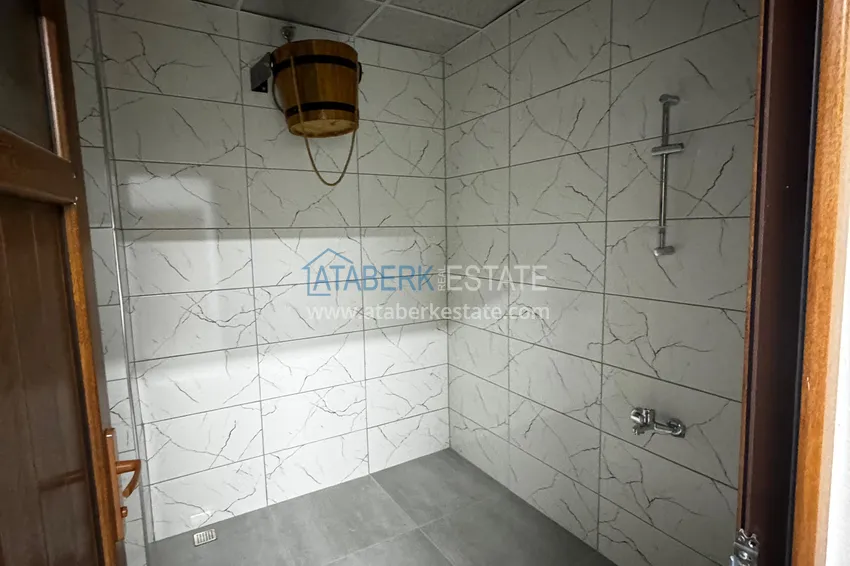 One bedroom apartment with separate kitchen and side sea view in Mersin, Tomyuk district 35 