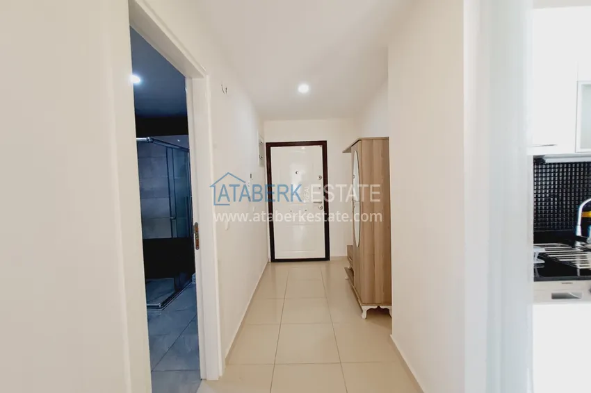Purchase 1+1 apartment with furniture and mountain views in a complex with infrastructure - Avsallar district, Alanya 2 