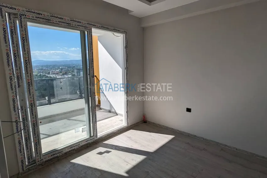 Purchase  One bedroom apartment with separate kitchen and side sea view in Mersin, Tomyuk district 7 