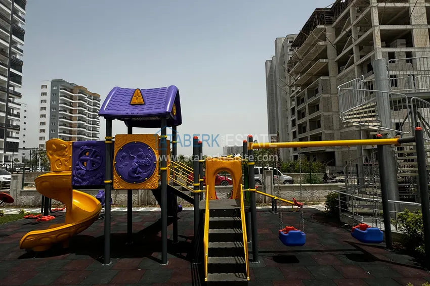 One bedroom Apartment with Fine Finishing and Mountain View in Tomyuk District, Mersin. Installment is possible 10 