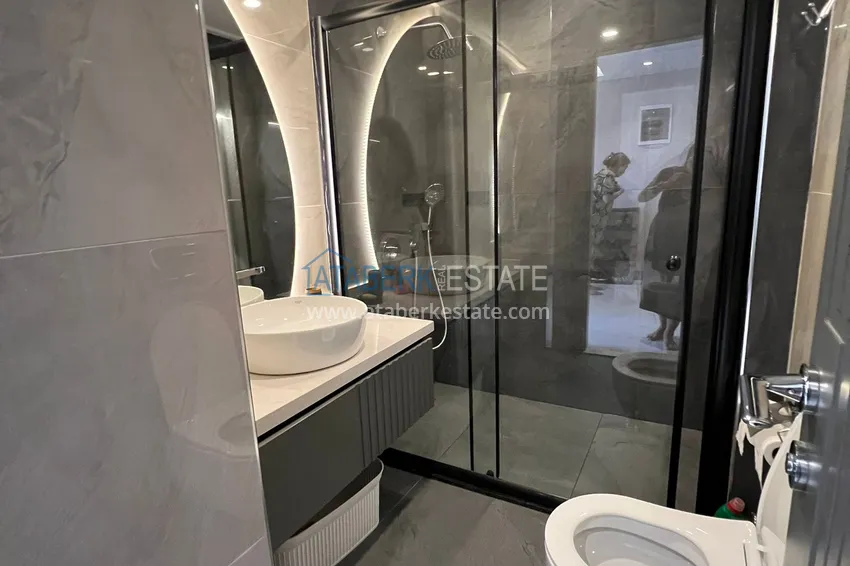 Purchase  Brand new furnished 2 bedroom apartment in the center of Alanya - Cleopatra Beach area 9 