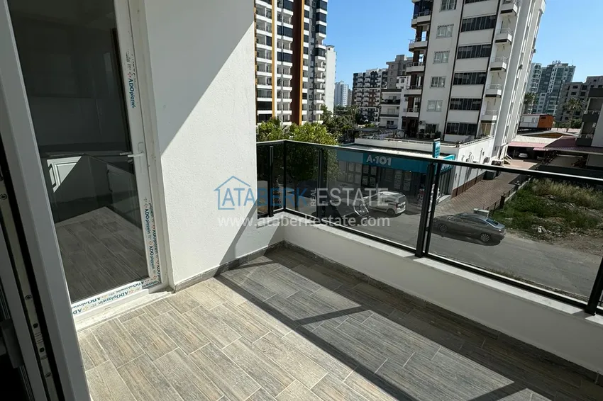 Buy cheap 1+1 apartment in a new complex from the owner in the Tomyuk-Mersin area 11 