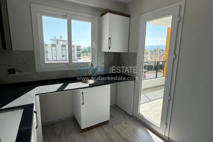 Buy cheap 1+1 apartment in a new complex from the owner in the Tomyuk-Mersin area 4 