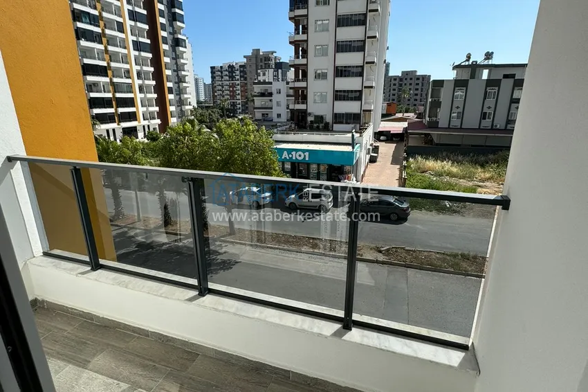 Buy cheap 1+1 apartment in a new complex from the owner in the Tomyuk-Mersin area 7 