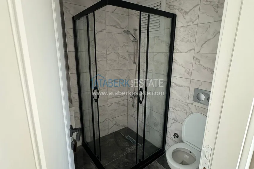 Buy cheap 1+1 apartment in a new complex from the owner in the Tomyuk-Mersin area 8 