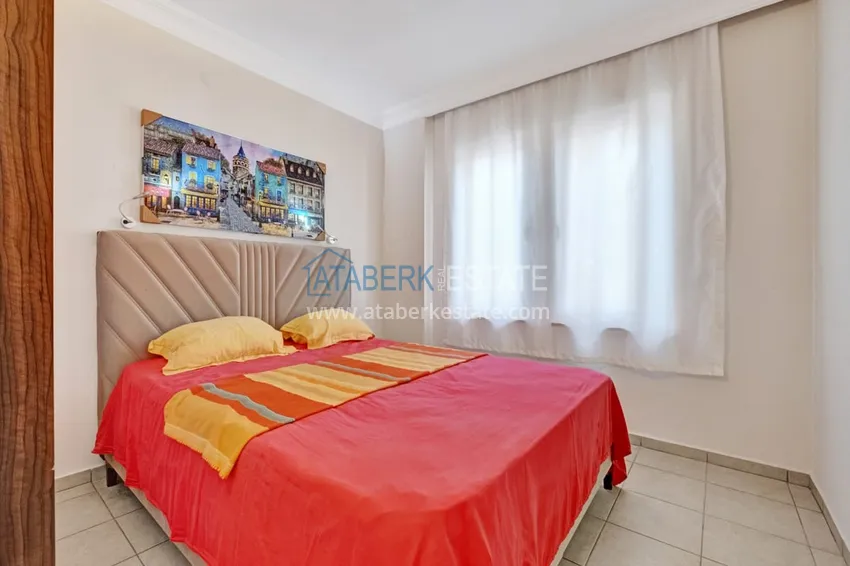 Purchase  Turnkey one-bedroom apartment with a glazed balcony near Cleopatra Beach - Alanya Center 10 