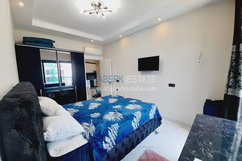 Purchase  1+1 apartment with furniture and sea views in a complex on the beachfront — Alanya, Kargicak district 11 