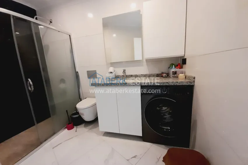 Purchase  1+1 apartment with furniture and sea views in a complex on the beachfront — Alanya, Kargicak district 15 