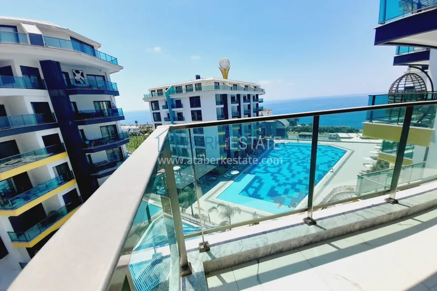 Purchase  1+1 apartment with furniture and sea views in a complex on the beachfront — Alanya, Kargicak district 18 