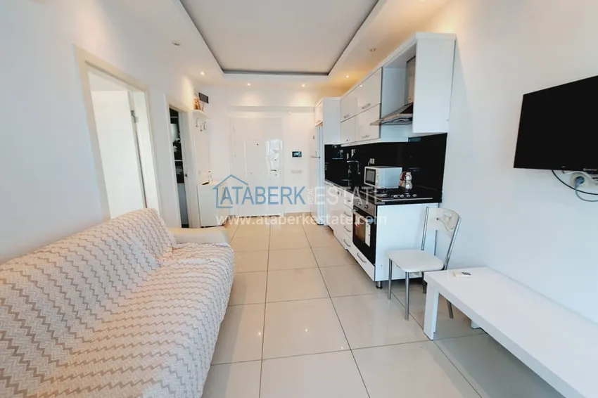 Purchase  1+1 apartment with furniture and glazed balcony in the center of Alanya - Cleopatra beach area 2 