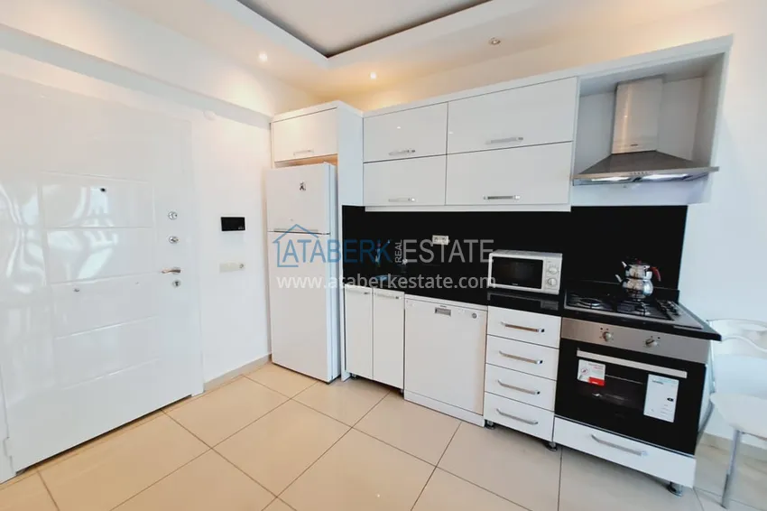 Purchase  1+1 apartment with furniture and glazed balcony in the center of Alanya - Cleopatra beach area 3 