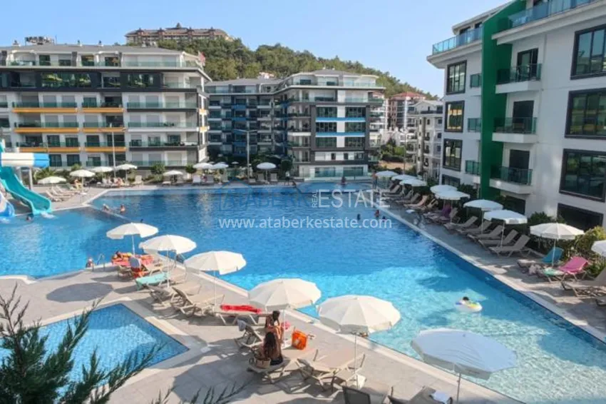 1+1 apartment with furniture and sea views in a complex on the beachfront — Alanya, Kargicak district 4 