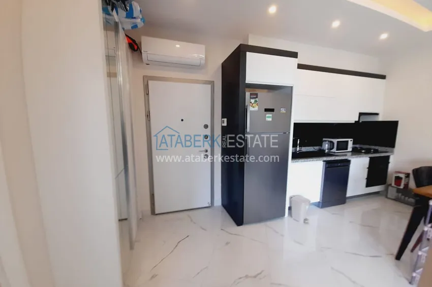 Purchase  1+1 apartment with furniture and sea views in a complex on the beachfront — Alanya, Kargicak district 5 