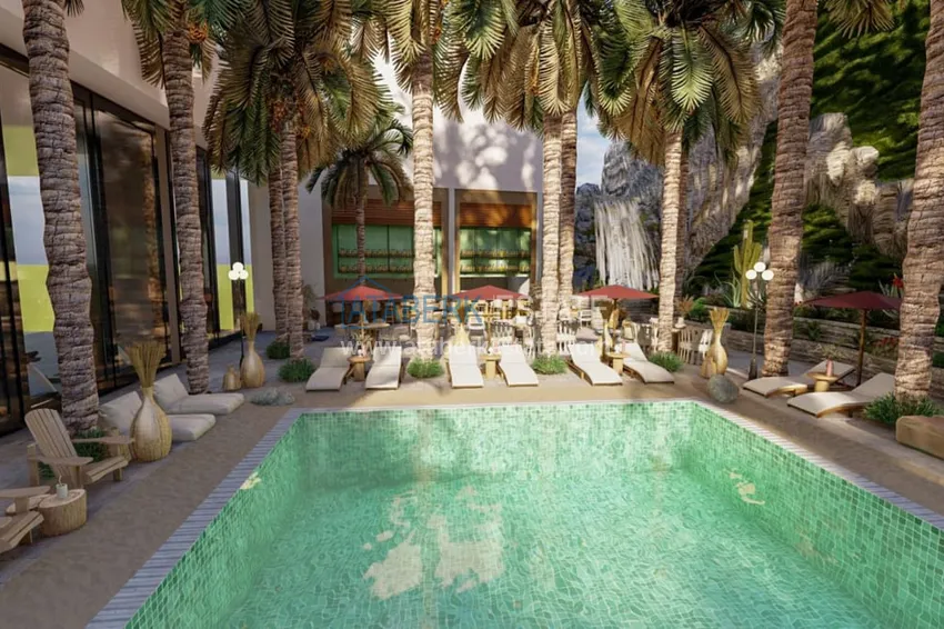 Residential complex under construction on the beachfront in Antalya, Lara - Guzeloba district 7 