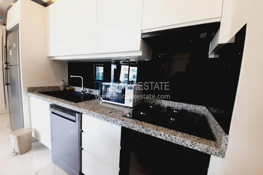 Purchase  1+1 apartment with furniture and sea views in a complex on the beachfront — Alanya, Kargicak district 6 