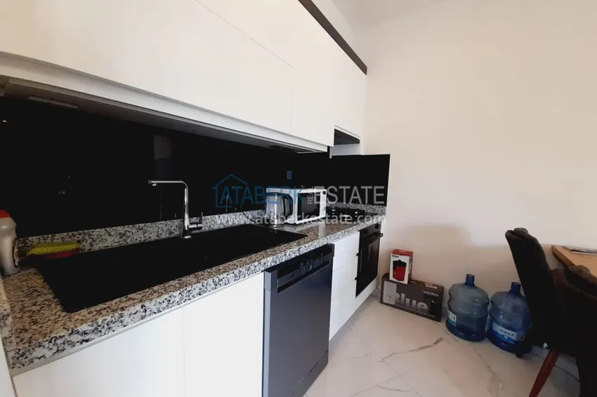 Purchase  1+1 apartment with furniture and sea views in a complex on the beachfront — Alanya, Kargicak district 7 