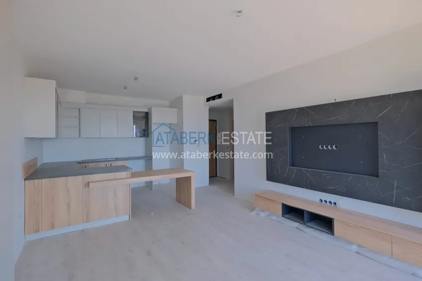 Photo -  Residential complex under construction on the beachfront in Antalya, Lara - Guzeloba district 2 