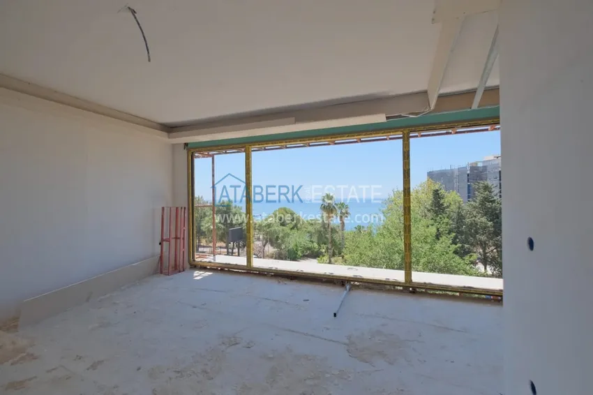 Photo -  Residential complex under construction on the beachfront in Antalya, Lara - Guzeloba district 3 