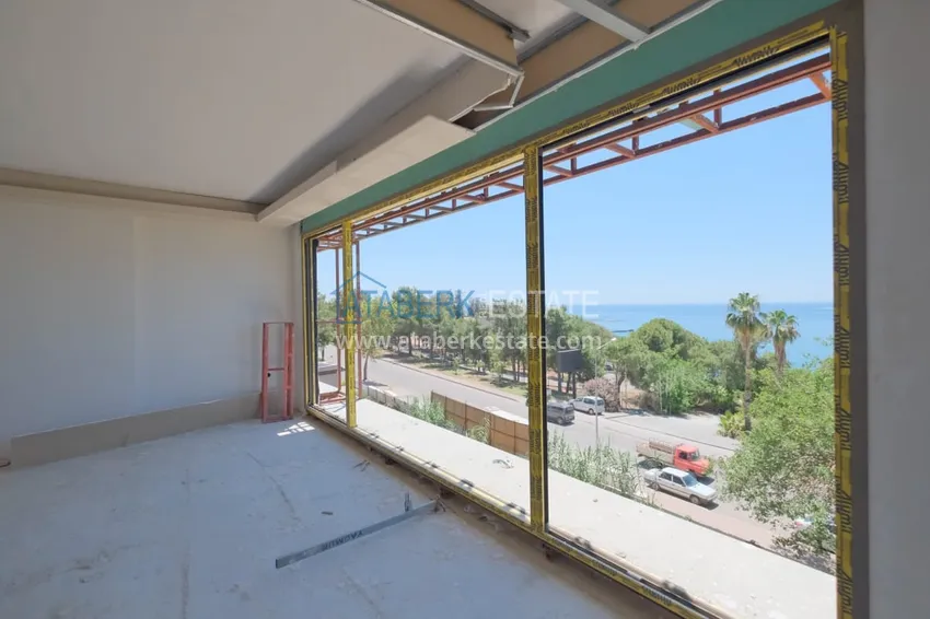 Photo -  Residential complex under construction on the beachfront in Antalya, Lara - Guzeloba district 4 